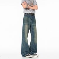 Pantalon ample et respirant pour homme, style américain rétro, en denim délavé et usé, coupe mi-large, design déchiré, style couteau courbé
