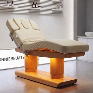 Table de massage électrique moderne avec appui-tête intégré, structure en bois, revêtement en cuir PU, mobilier commercial pour salon, salon de beauté - Product Image 1