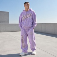 Ensemble de survêtement personnalisé pour homme en coton respirant à 100 % avec imprimé étoile, pantalon de jogging à jambe large et fermeture éclair sur le devant, et sweat à capuche décontracté pour l'automne
