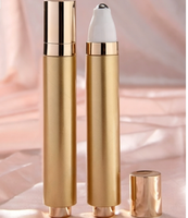 Flacon vide rond de 15 ml pour crème contour des yeux et huile essentielle, avec applicateur roll-on à pression par le bas pour massage