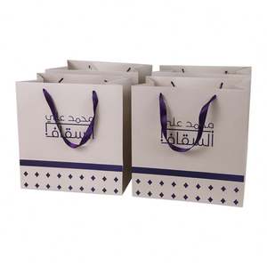 Custom Printed Logo Luxury Clothing Shop Packaging Cardboard Natural Style Paper Bag With Ribbon <b>Rope</b> - Product Image 6