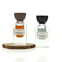 Flacon de parfum de luxe à base épaisse 30ml 80ml 100ml en verre transparent lourd, flacon de parfum vide élégant avec bouchon mat personnalisé