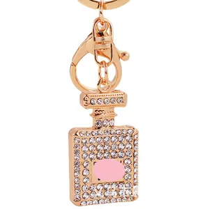 n alloy diamond-inlaid perfume bottle key chain girls fashion bag hanging decoration car pendant wholesale factory direct sales