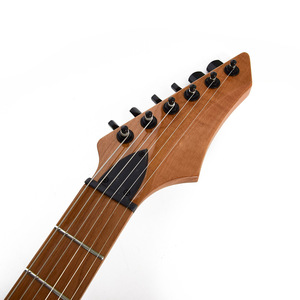 Guitarra eléctrica transfronteriza Alnico5 pequeña con doble vibrato, guitarra eléctrica de rock para hombres y mujeres con núcleo de flor de durazno completo - Product Image 4