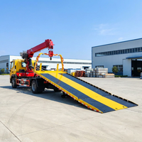 Camion-grue à structure métallique pour la levée de poutres en acier, l'installation de cadres et les projets d'ingénierie de structures métalliques