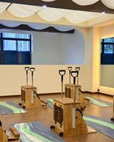 Chaise Wunda de Pilates en érable pour entraînement professionnel, solide, stable, silencieuse, fluide, pour l'activation, l'équilibre, le contrôle, la coordination et l'étirement