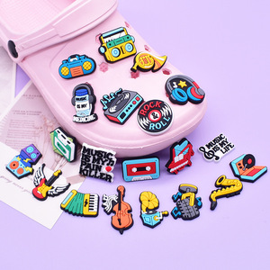 Accesorios <span class=keywords><strong>de</strong></span> PVC económicos para decoración <span class=keywords><strong>de</strong></span> zapatos, dijes desmontables <span class=keywords><strong>de</strong></span> base plana para fundas <span class=keywords><strong>de</strong></span> <span class=keywords><strong>teléfono</strong></span>, clips para bolsos <span class=keywords><strong>de</strong></span> playa, zapatos y accesorios para fiestas musicales - Product Image 1