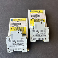 Nouveau contrôleur de programmation PLC TWO Merlin Gerin MG24112 1 pôle 3AMP 277VAC Garantie de 12 mois Plc