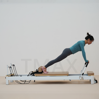 Tmax Pilates Reformer Noir et Blanc en Aluminium – Appareil de Pilates Durable pour la Maison et la Salle de Sport – Fabrication Directe