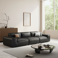 Canapé d'angle trois places de luxe italien, minimaliste, vintage, en tissu noir, avec assise en mousse, en cuir pleine fleur véritable, style mi-moderne, avec éléments en bois pour salon