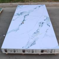 Panneau mural en PVC brillant, durable et résistant à l'eau, avec motifs de pierre artistique variés, grain turquoise doré, pour projets commerciaux (vente en gros)