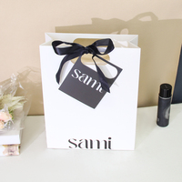 Emballage de luxe, poignées découpées, logo personnalisé, sacs cadeaux en papier pour vêtements, sous-vêtements, commerce de détail, magasin