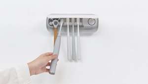 أحدث حامل فرشاة أسنان يثبت على الحائط عرض الوقت جهاز تعقيم فرشاة الأسنان بالأشعة فوق البنفسجية مجفف حقيقي مزود بإضاءة ليلية - Product Image 3