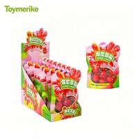 Bonbons gélifiés en gros, fourrés et juteux, en forme d'œil, de pastèque et de fraise, type fudge sandwich, en sachet pour enfants