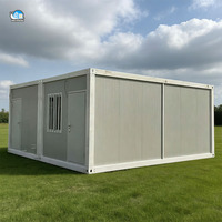 Maison modulaire mobile de luxe avec panneaux extérieurs en bois, fabriquée à partir d'un conteneur préfabriqué avec finitions en bois