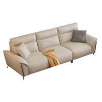 Ensemble de meubles de salon en cuir crème de luxe moderne, canapé 3 places, fauteuil, ottoman, table basse en marbre, salon, hôtel, commercial