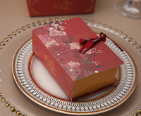 Boîte de papier en carton cadeau pliante faite à la main de luxe finition gaufrée en forme de livre pour biscuits aliments pour bébés plusieurs matériaux recyclés