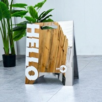 Panneau publicitaire sur pied en acier inoxydable finition miroir avec technologie d'affichage UV