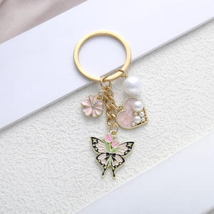 Porte-clés exquis en gros avec pendentifs papillon, fleur, coeur et perle - Product Image 5