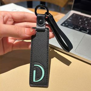 Porte-clés avec 26 lettres de l'alphabet anglais, accessoires de voiture en cuir modernes, petit pendentif simple personnalisable - Product Image 5