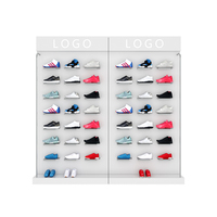 Étagères de présentation de chaussures en métal noir pour boutique, aménagements de magasin de détail modernes, écologiques et sur mesure haut de gamme