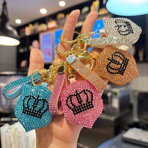 พวงกุญแจรูปทรงโล่ประดับคริสตัลวิบวับ สายคล้องข้อมือคริสตัลระยิบระยับ ห่วงกุญแจโลหะสีทองสุดหรู - Product Image 2