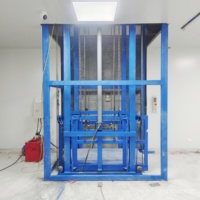 Plateforme élévatrice hydraulique personnalisée de 1 à 5 tonnes pour entrepôt, avec rails de guidage et deux plateformes de levage simples