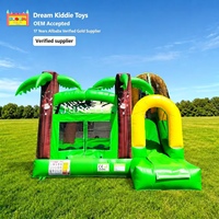 Château gonflable de luxe avec toboggan, thème Jungle Tropicale Palmiers, pour événements et fêtes