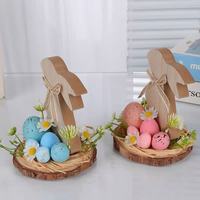 Décorations de table modernes en bois en forme de lapin avec fleurs artificielles et œufs de Pâques simulés pour les fêtes