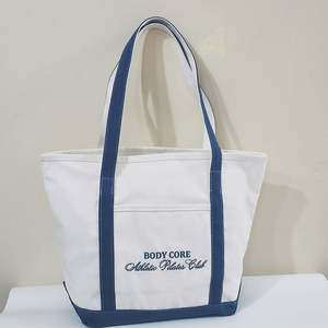 Sac fourre-tout en toile de coton biologique personnalisé avec poignée en corde, fermeture à glissière, design imprimé pour une utilisation publicitaire - Product Image 4