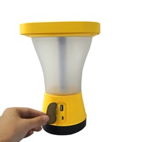 Système d'éclairage solaire LED portable à 360 degrés pour l'extérieur, double charge AC/solaire, indice de protection IP33, 3 niveaux de luminosité, chargeur de téléphone portable