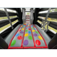 Structure gonflable dinosaure à succès avec toboggan aquatique, en PVC durable, idéale pour événements extérieurs et parcs d'attractions