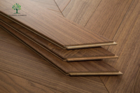 Plancher de danse de mariage à motifs classiques modernes Parquet en coquille durable Palissandre Noyer Chevron Plancher en bois d'ingénierie brossé