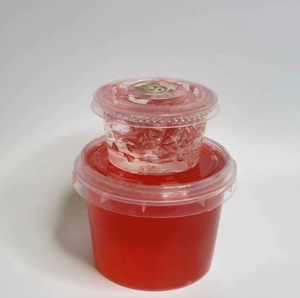 Jouet en plastique souple avec perles violettes dans un récipient transparent, anti-stress - Product Image 2