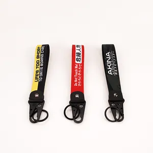 Porte-clés créatif personnalisé mignon ruban moto porte-clés corde suspendue tide marque voiture cadeau porte-clés