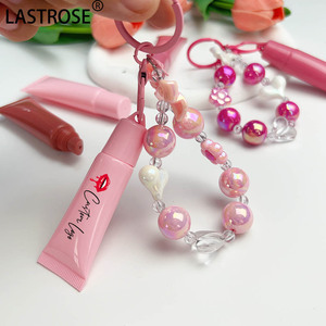 Tubo de plástico rosa para apretar, brillo de labios, tubo <span class=keywords><strong>Lipoil</strong></span>, crema de labios vacía, contenedor de esencia de labios con llavero bonito, embalaje cosmético - Product Image 1