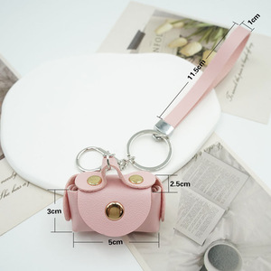 Monedero de PU con cuerda de mano, llavero, colgante creativo para bolso, mini bolsa portátil bonita para guardar auriculares y cables de datos - Product Image 2