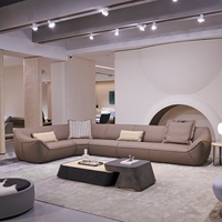 Ensemble de canapés d'angle en L incurvé de designer, en cuir véritable épais et rembourré en éponge, pour salon de villa de luxe moderne