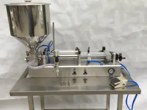 Riempitrice pneumatica semi automatica macchina riempitrice orizzontale per il corpo riempitrice di pasta di crema spessa