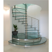 Escaliers en spirale en verre de luxe avec éclairage LED et structure en acier au carbone pour villa