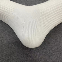 Chaussettes de sport en coton, polyester et élasthanne de haute qualité, tricotées, pour le basketball, avec logo personnalisé et résistance aux déchirures au niveau du bord.