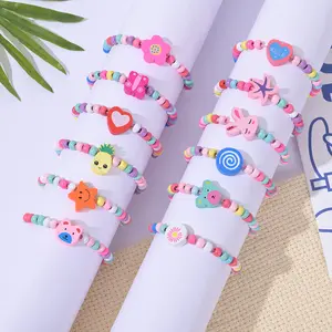12 pz/pacco all'ingrosso carino colorato fiore animale cartone animato perline di legno braccialetto gioielli per bambini ragazza ragazzo regali braccialetto di compleanno
