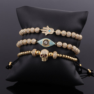 Cho Thuê Trang Sức Thiết Kế Mới Sang Trọng CZ Pave 18 Mạ Vàng Skull Eye Tay Charms Phụ Nữ Đàn Ông Macrame Điều Chỉnh Vòng Đeo Tay - Product Image 1
