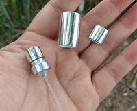 Nouveau flacon de parfum goutte pour les yeux en verre électrolytique de style arabe de 50ml plat avec vaporisateur d'argent et pulvérisateur à pompe