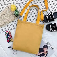 Vente en gros de Bolsas De Tela De Color College Sac en tissu d'épicerie réutilisable uni Sac fourre-tout en toile de coton avec poche