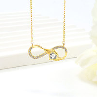 Sofistication intemporelle, collier d'amour Mobius en argent sterling 925, chaîne de clavicule, pendentif cœur infini rotatif artisanal romantique