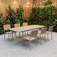 Ensemble de table à manger d'extérieur moderne SERWALL en HDPE imperméable, 7 pièces avec trou pour parasol et 6 chaises, gris