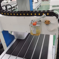 Vente chaude 4 aixs 6090 bois CNC routeur machine pour la fabrication de meubles contreplaqué MDF aluminium pierre