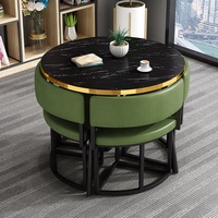 Ensemble de salle à manger GEDO moderne et peu encombrant, table en MDF avec bord doré, pieds en métal, 4 chaises en cuir PU, couleur personnalisable
