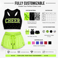 Ensemble de soutien-gorge de cheerleading personnalisé noir et vert néon avec logo en strass, soutien-gorge dos nageur et short en maille à volants, tenue d'entraînement de cheerleading
